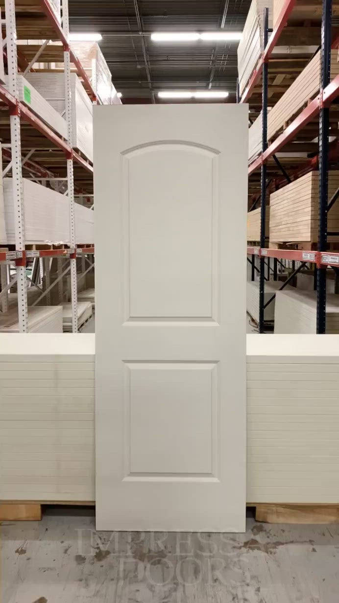 2 Panel Arch Caiman Primed Slab Solid Core 7'0" (84") 1-3/8
