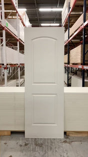 2 Panel Arch Caiman Primed Slab Solid Core 7'0" (84") 1-3/8